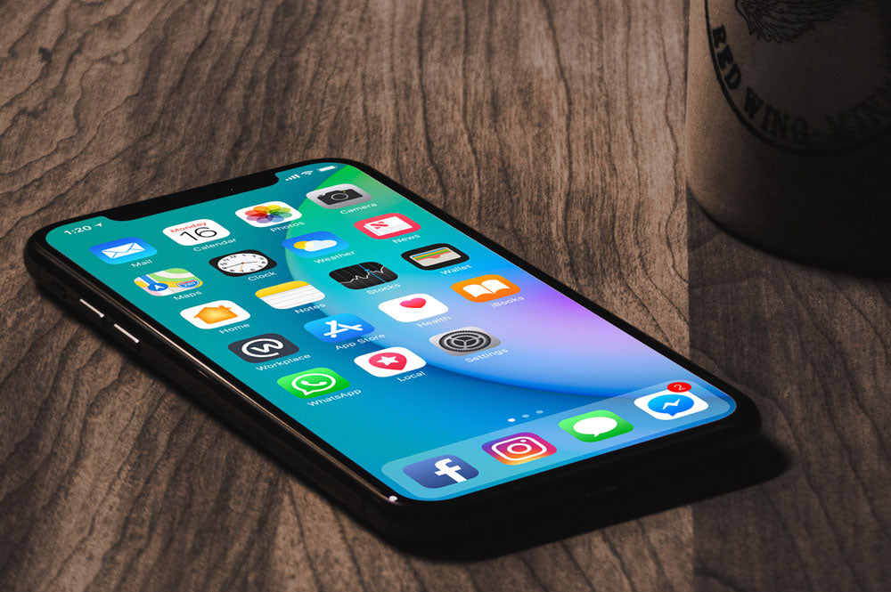 iPhone X with Coffee Mug Mockup