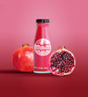 Isolated Bottle Of Fruit Juice And Pomegranate Psd