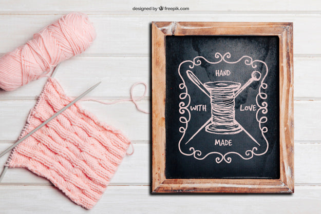 Knitting Concept With Slate And Pink Wool Psd