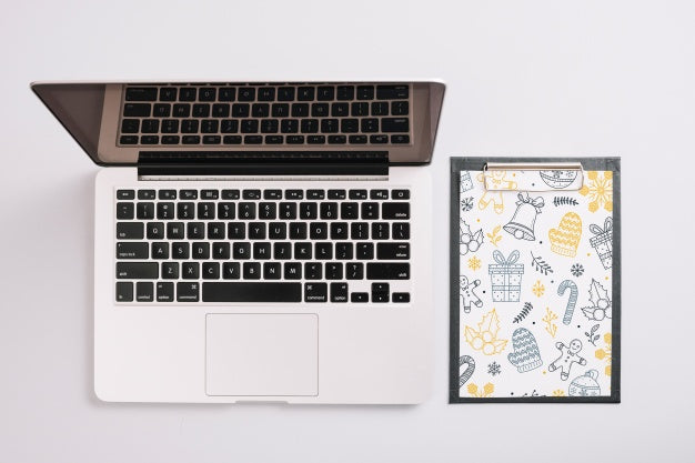 Laptop And Clipboard Mockup With Christmas Concept Psd