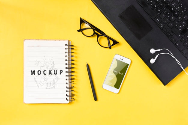 Laptop And Notebook On Desk Concept Psd