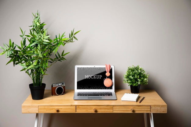 Laptop Mock-Up With Headphones And Camera Psd