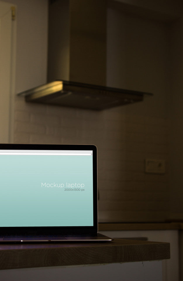 Laptop Mockup In Kitchen Psd