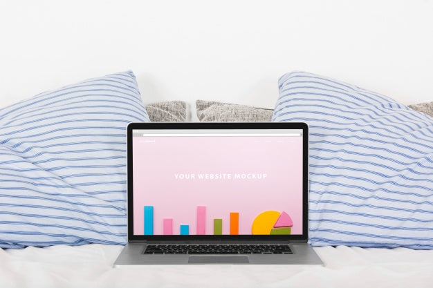 Laptop Mockup On Bed Psd