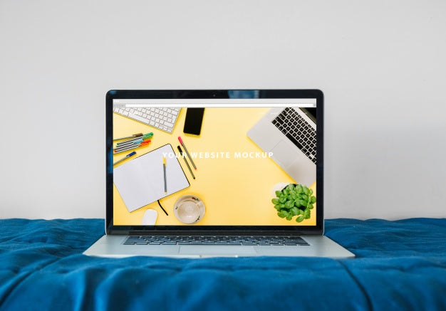 Laptop Mockup On Bed Psd