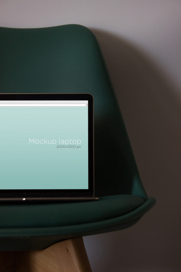 Laptop Mockup On Chair Psd