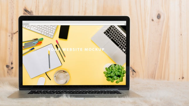 Laptop Mockup On Soft Bed Psd