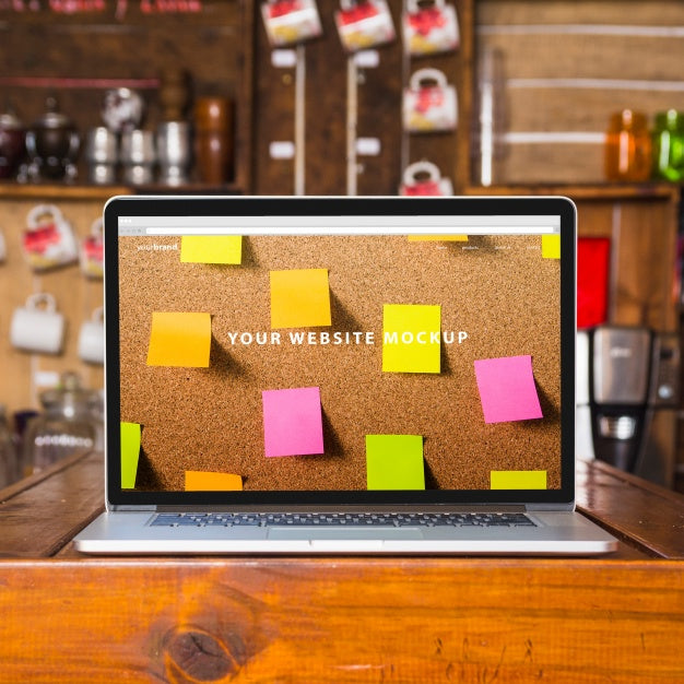 Laptop Mockup On Wooden Table Psd