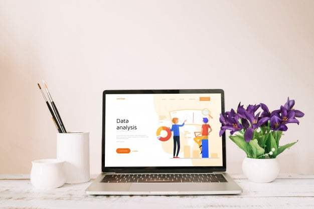 Laptop Mockup On Workspace Table Psd