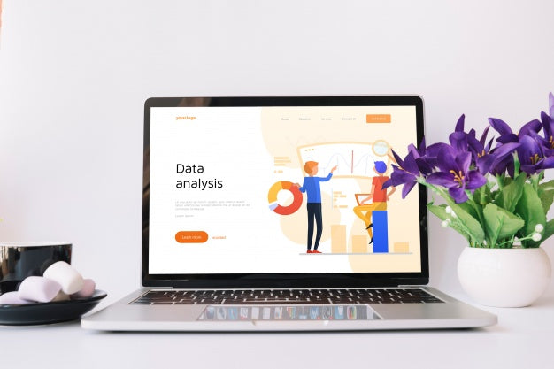 Laptop Mockup On Workspace Table Psd