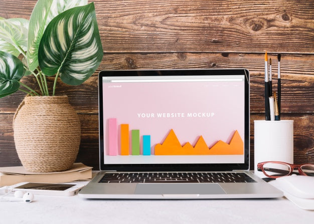 Laptop Mockup On Workspace Table Psd