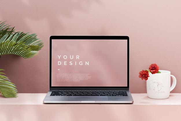 Laptop Mockup With A Pastel Pink Wall Psd
