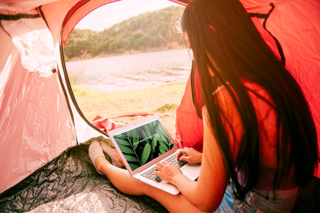 Laptop Mockup With Camping In Nature Concept Psd