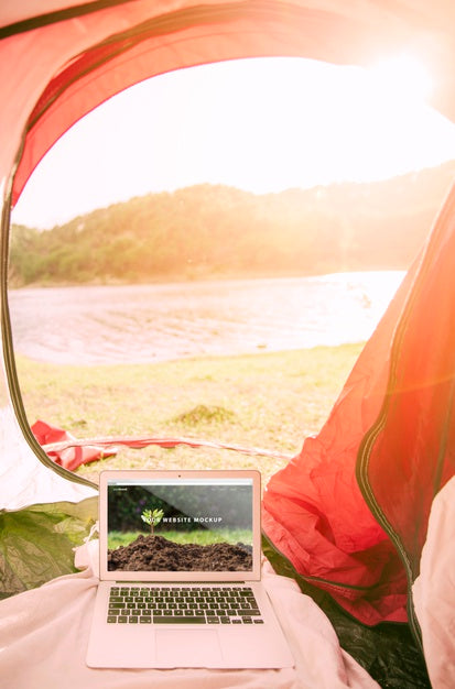 Laptop Mockup With Camping In Nature Concept Psd