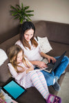 Laptop Mockup With Mother And Daughter Psd