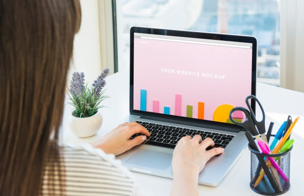 Laptop Mockup With Person Typing On Keyboard Psd