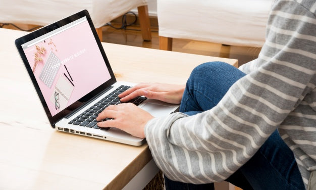 Laptop Mockup With Woman Working At Home Psd