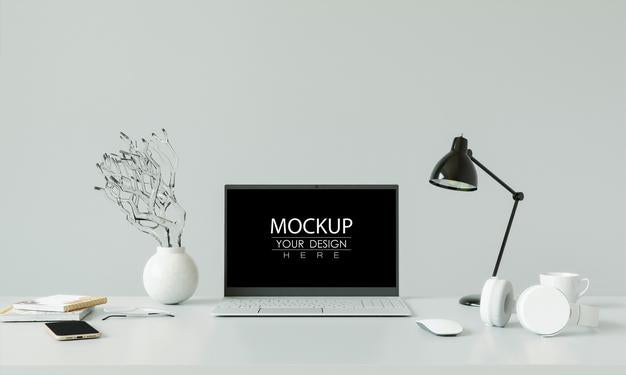 Laptop On Desk In Workspace Mockup Psd