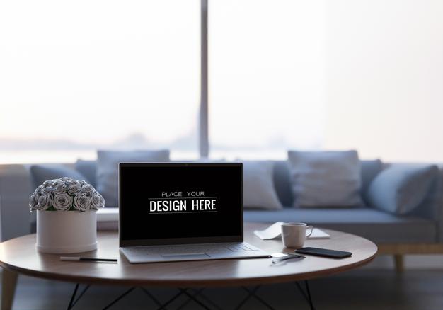 Laptop On Desk In Workspace Mockup Psd