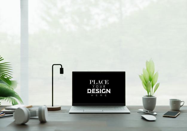 Laptop On Desk In Workspace Mockup Psd