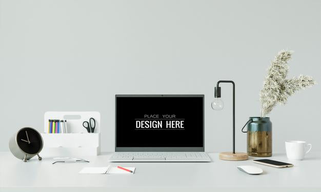 Laptop On Desk In Workspace Mockup Psd