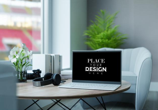 Laptop On Desk In Workspace Mockup Psd