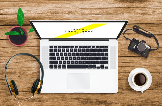 Laptop On Wooden Desktop Mock Up Psd