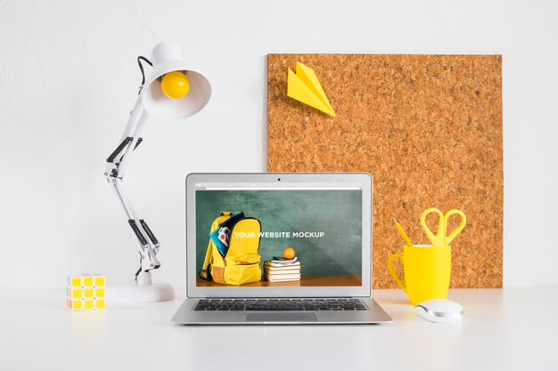 Laptop With Mockup Screen In Clean And Tidy Workspace. Education Theme Psd