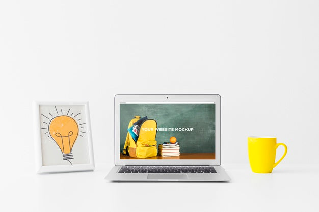 Laptop With Mockup Screen In Clean And Tidy Workspace. Education Theme Psd