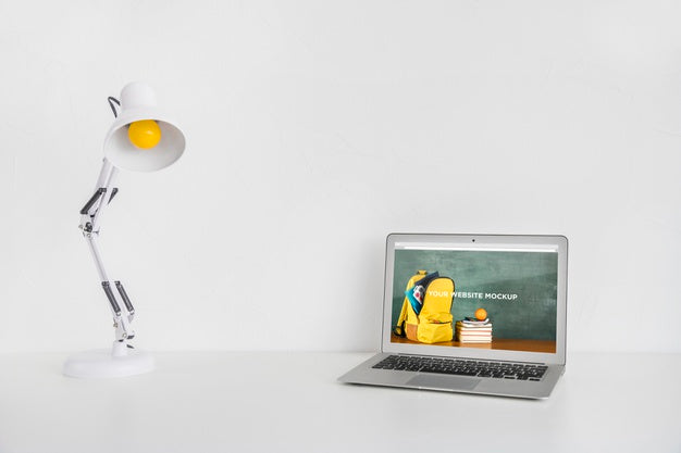 Laptop With Mockup Screen In Clean And Tidy Workspace. Education Theme Psd