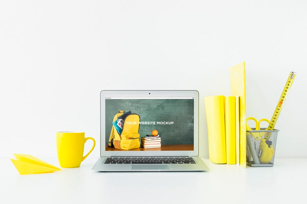 Laptop With Mockup Screen In Clean And Tidy Workspace. Education Theme Psd
