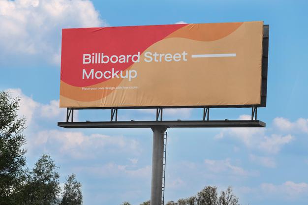 Large Billboard Mockup On Blue Sky With Clouds Psd