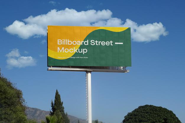 Large Billboard Mockup On Blue Sky With Clouds Psd