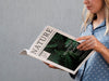 Lateral View Woman Holding A Nature Magazine Psd
