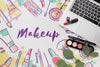 Lipstick And Makeup Palette On Table Psd