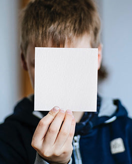 Little Boy Showing Square Card Mockup Psd