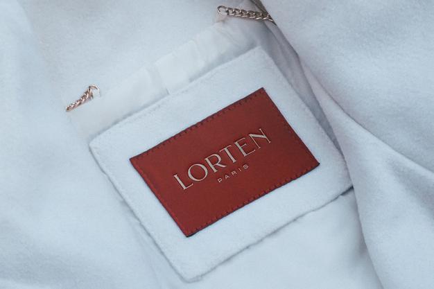 Logo Mockup White Coat Label Psd