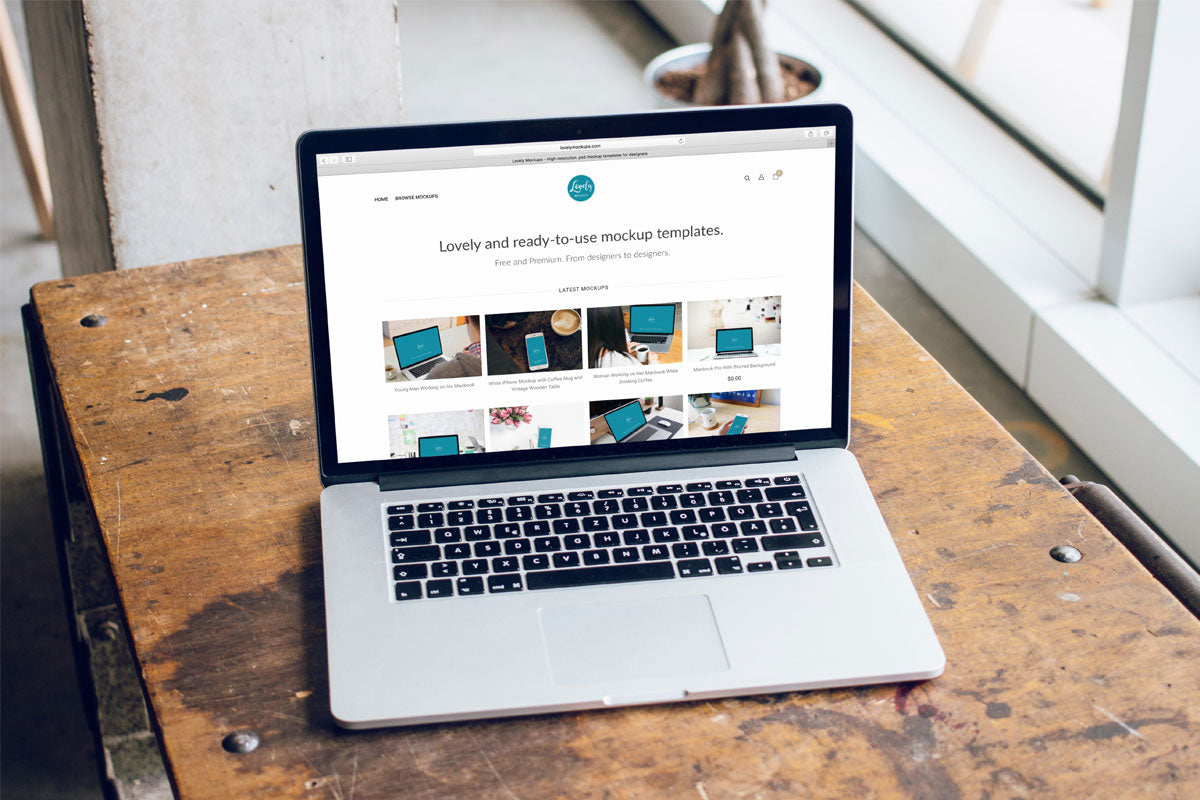 Macbook Pro 15" On Carpenter Desk Mockup