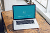 Macbook Pro 15" On Carpenter Desk Mockup