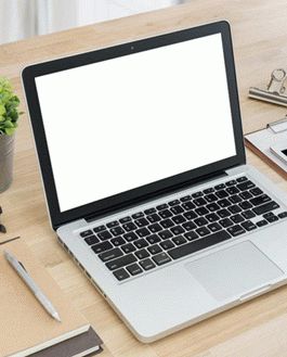 Macbook On Table Mockup Psd