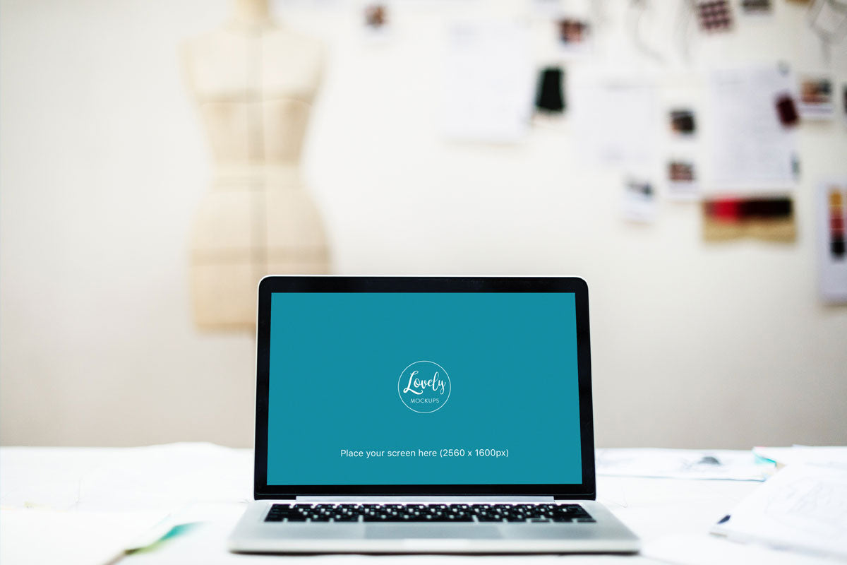 Macbook Pro Mockup on Table With Blurred Background