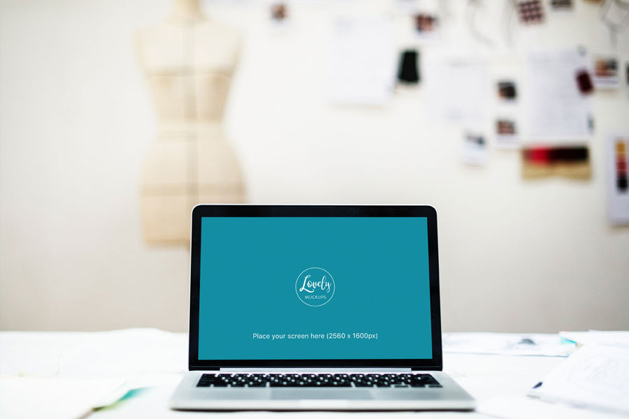 Macbook Pro Mockup on Table With Blurred Background