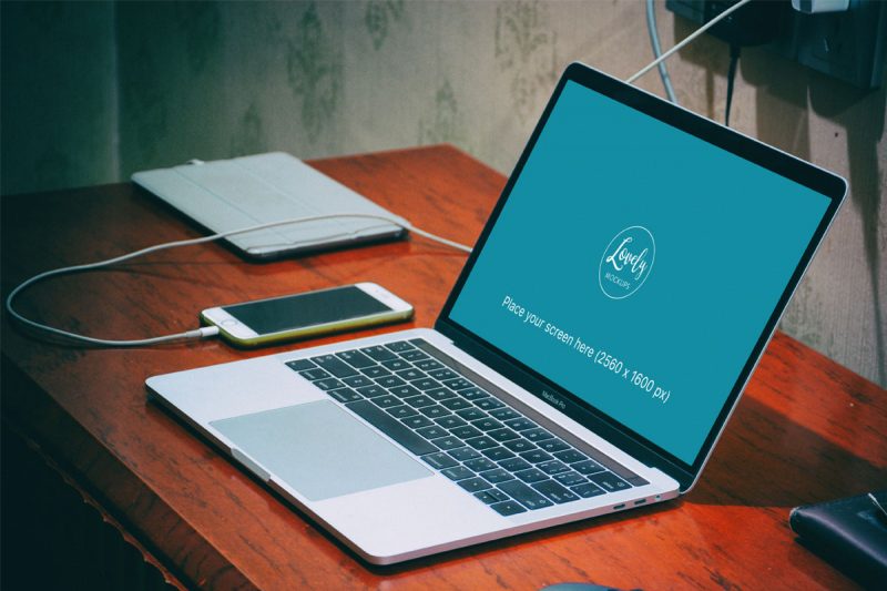Macbook Pro Mockup On Wooden Table