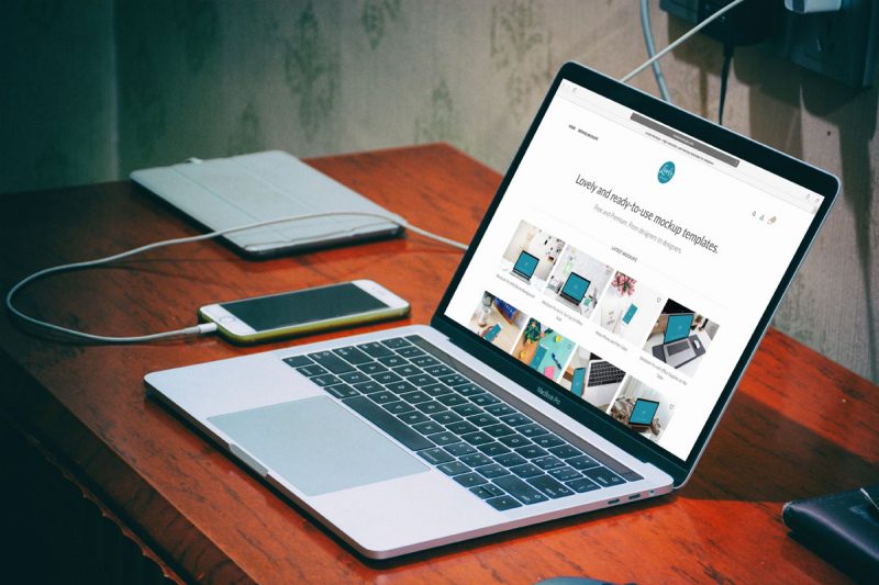 Macbook Pro Mockup On Wooden Table