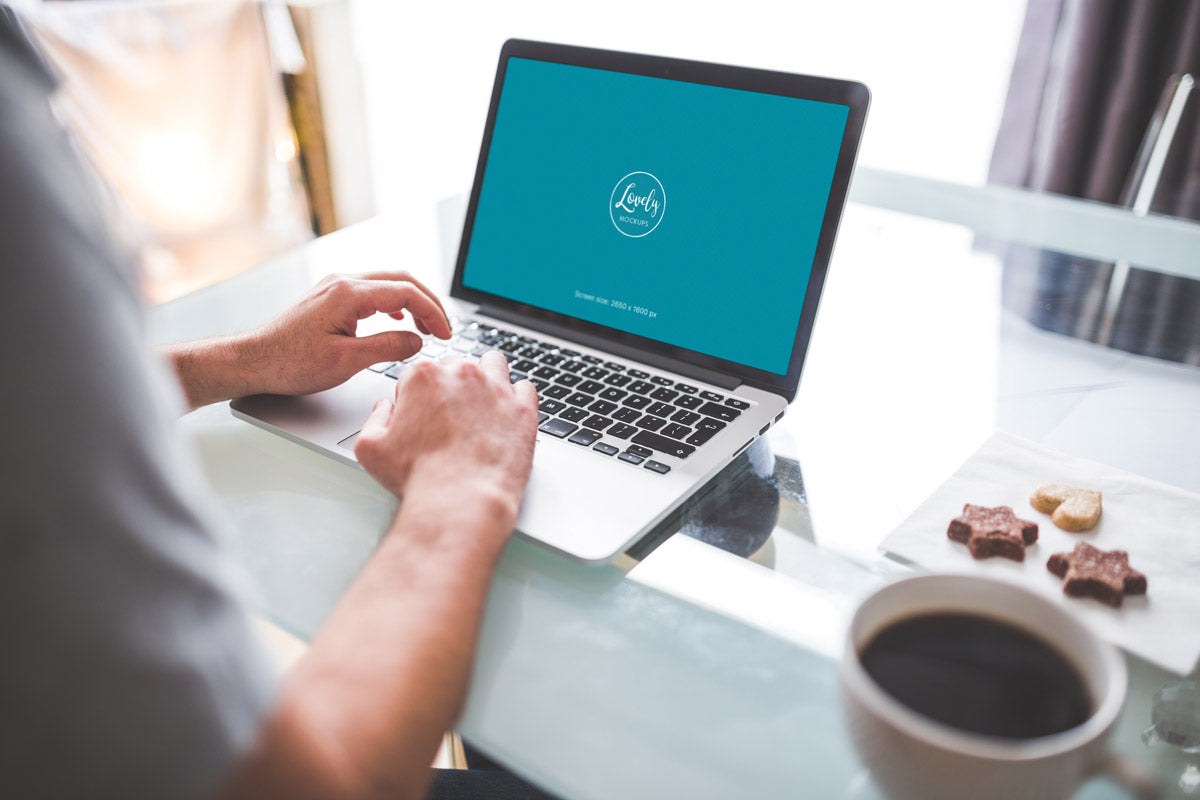 Macbook Pro Mockup with Cookies and Coffee Cup in Office