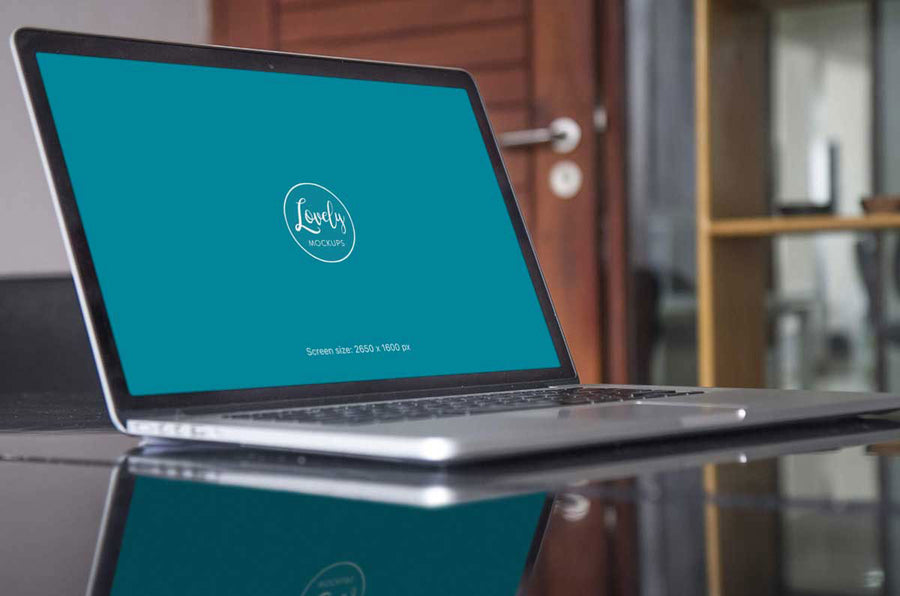 Apple Macbook Pro Mockup on a Glass Table Side View