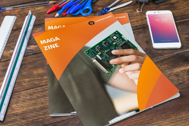 Magazine And Smartphone Mockup On Wooden Table With Pens And Rulers Psd