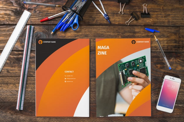 Magazine And Smartphone Mockup On Wooden Table With Pens And Rulers Psd