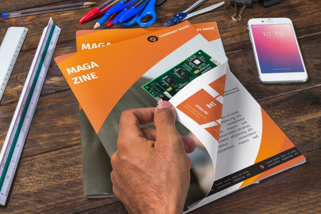 Magazine And Smartphone Mockup On Wooden Table With Pens And Rulers Psd