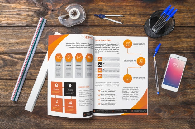 Magazine And Smartphone Mockup On Wooden Table With Pens And Rulers Psd